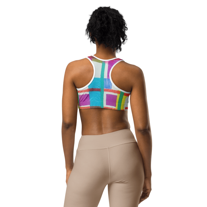 Back view of the 'MODRIAN' Sports Bra in colorful geometric patterns, crafted from soft, recycled, moisture-wicking fabric.